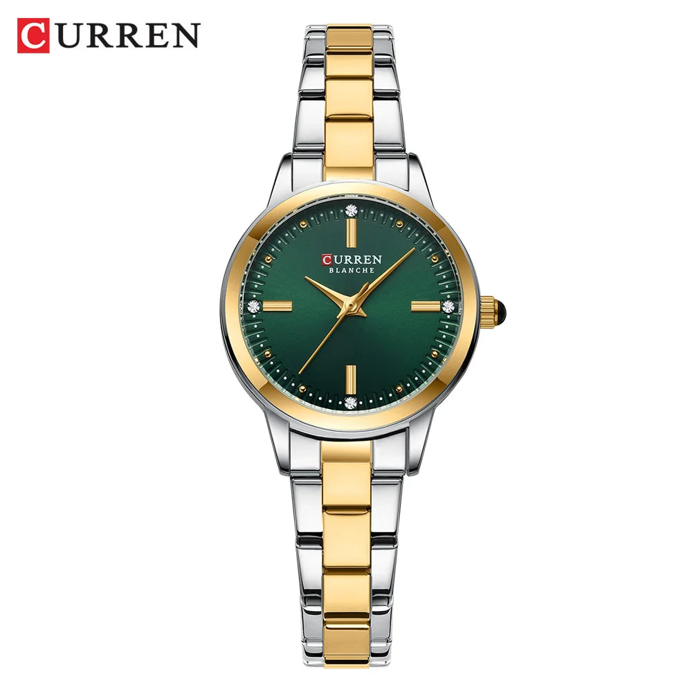 Curren watch with green dial and gold and silver band on white background