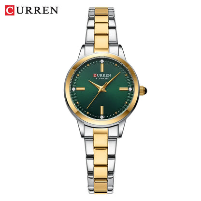 Curren watch with green dial and gold and silver band on white background