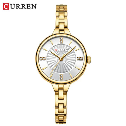 Gold Curren watch on a white background