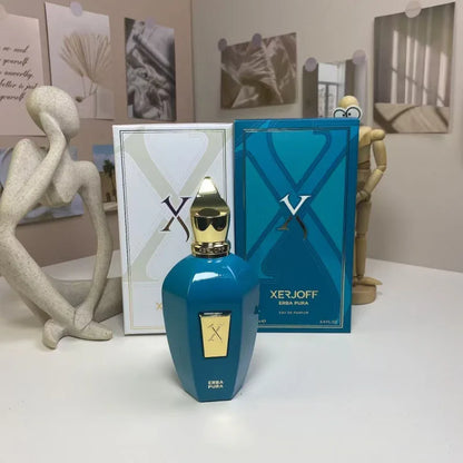 Blue Xerjoff perfume bottle with packaging on a white surface