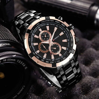 Luxury watch with black and rose gold design on a textured surface with camera lens in background