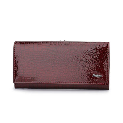 Maroon wallet with crocodile texture on a white background