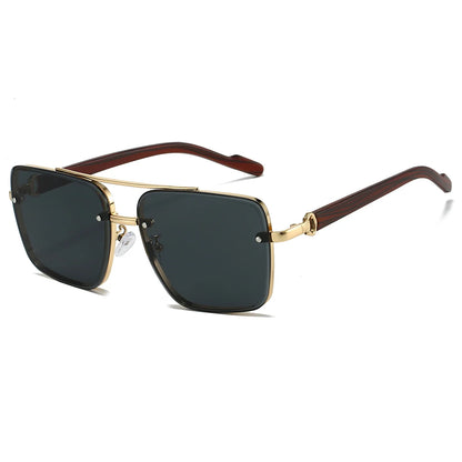 Sunglasses with gold frame and brown arm on a white background