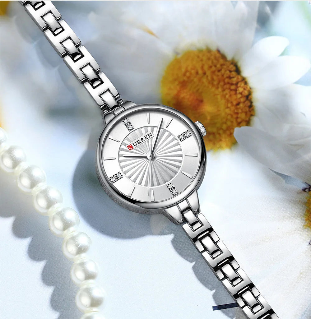 Silver watch with a floral background