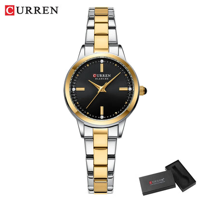 Curren watch with gold and silver band on a white background