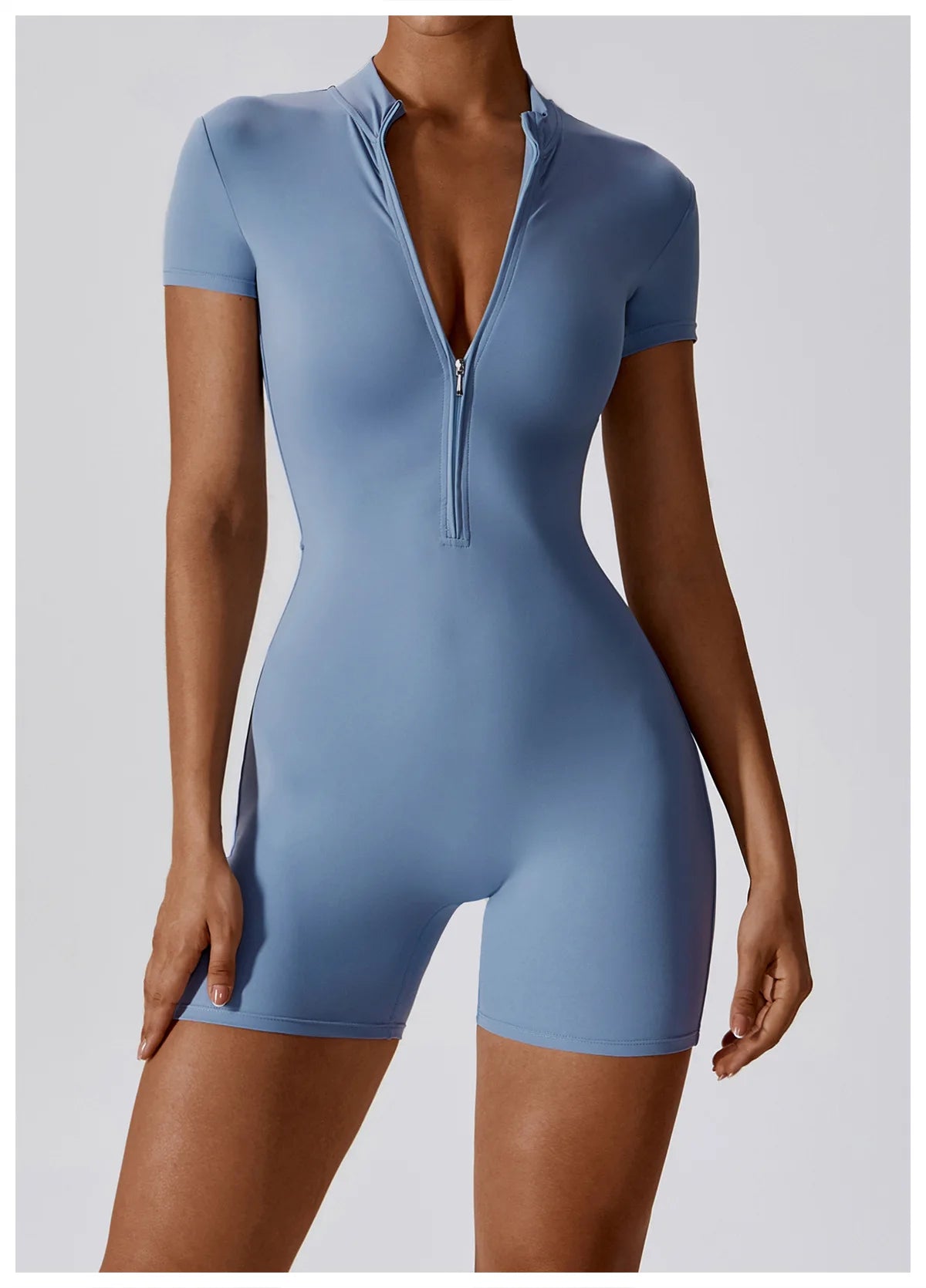 Blue bodysuit with a front zipper on a white background