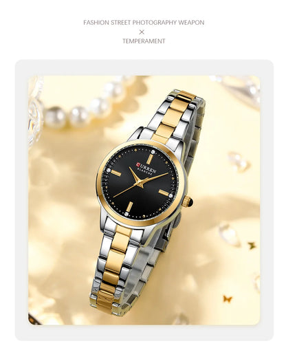 Two-tone watch with gold and silver straps on a soft yellow background