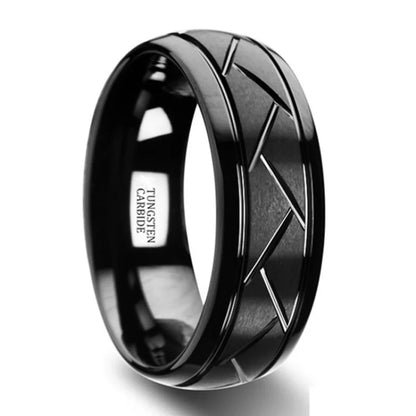 Black tungsten carbide ring with geometric design on a white background