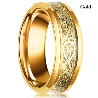 Gold ring with intricate design on a white background