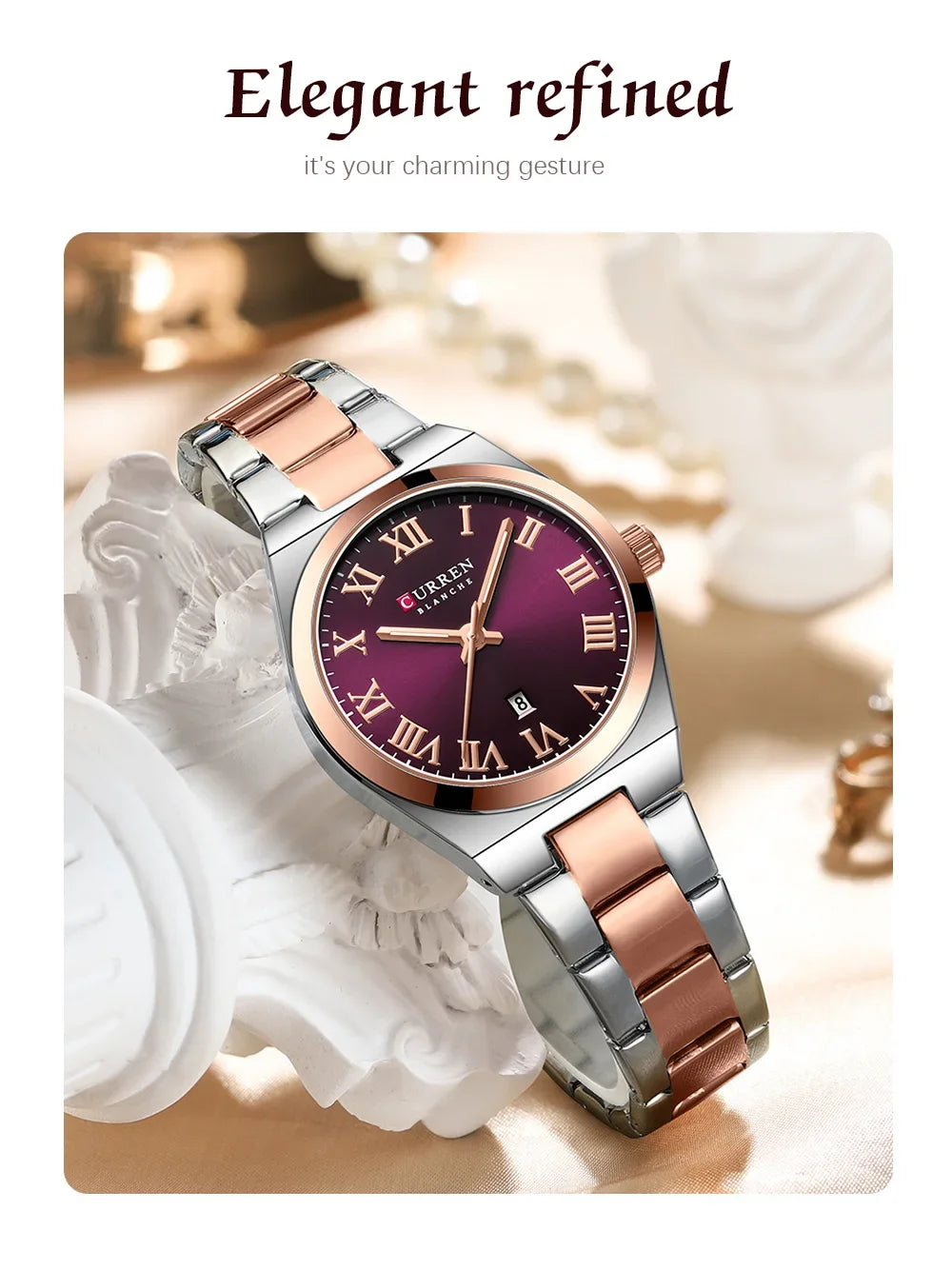 Silver and rose gold watch with purple dial on a decorative background
