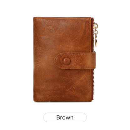 Brown leather wallet with a keychain on a white background