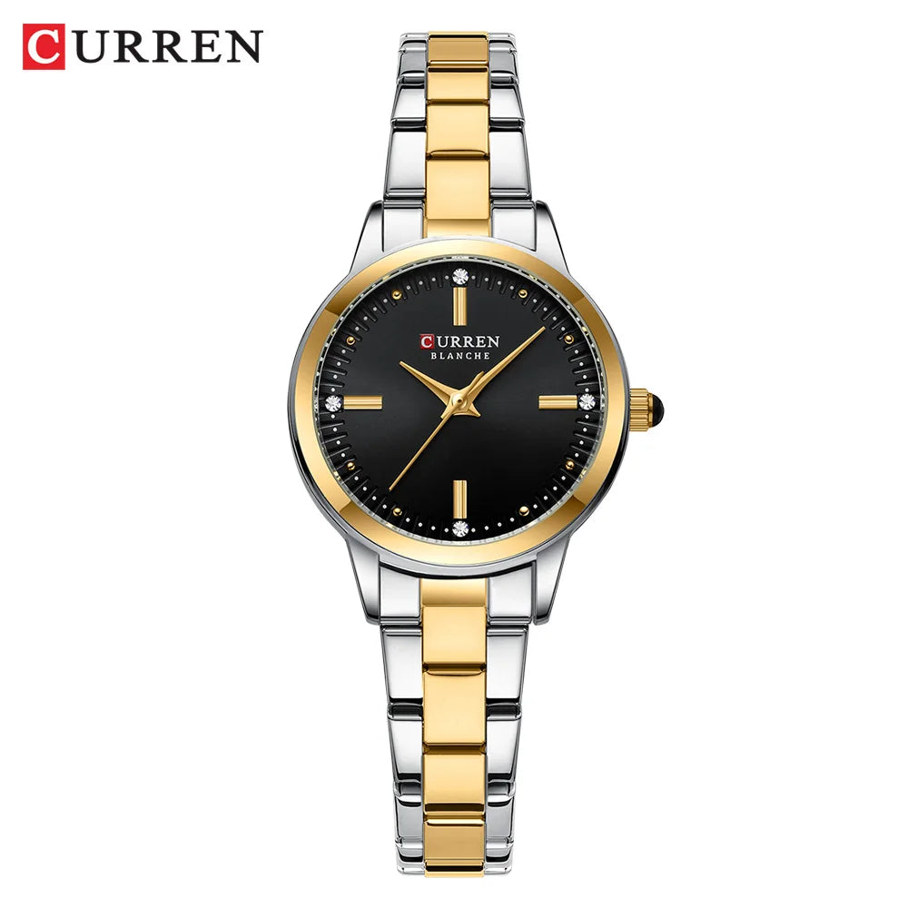 Curren watch with gold and silver band on a white background