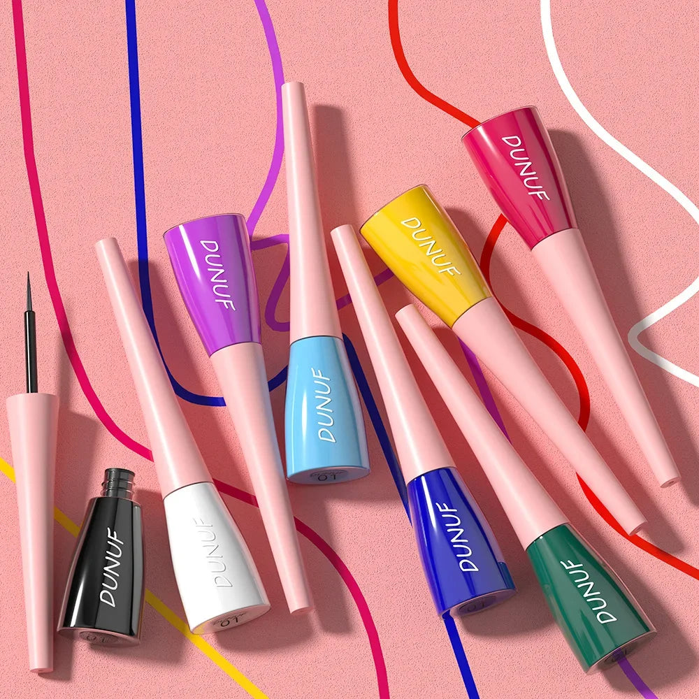 Colorful Dunuf lip products on a pink background with abstract lines