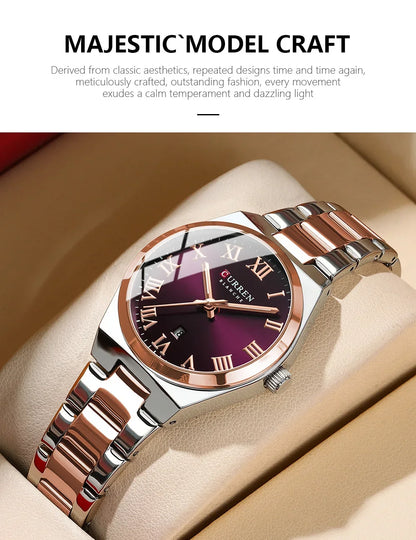 Luxury watch with purple dial and rose gold accents on a beige surface