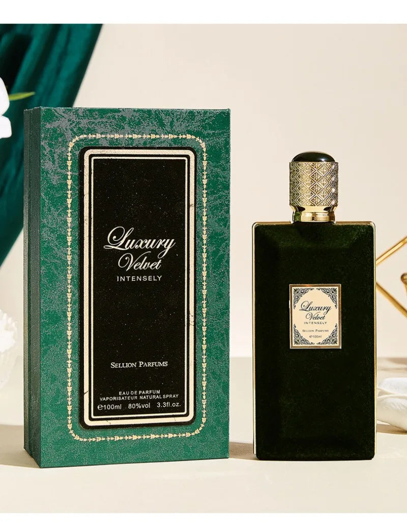 Black perfume bottle with 'Luxury Velvet' packaging on a light background
