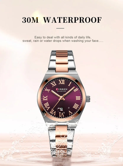 Watch with rose gold and silver band on a light background