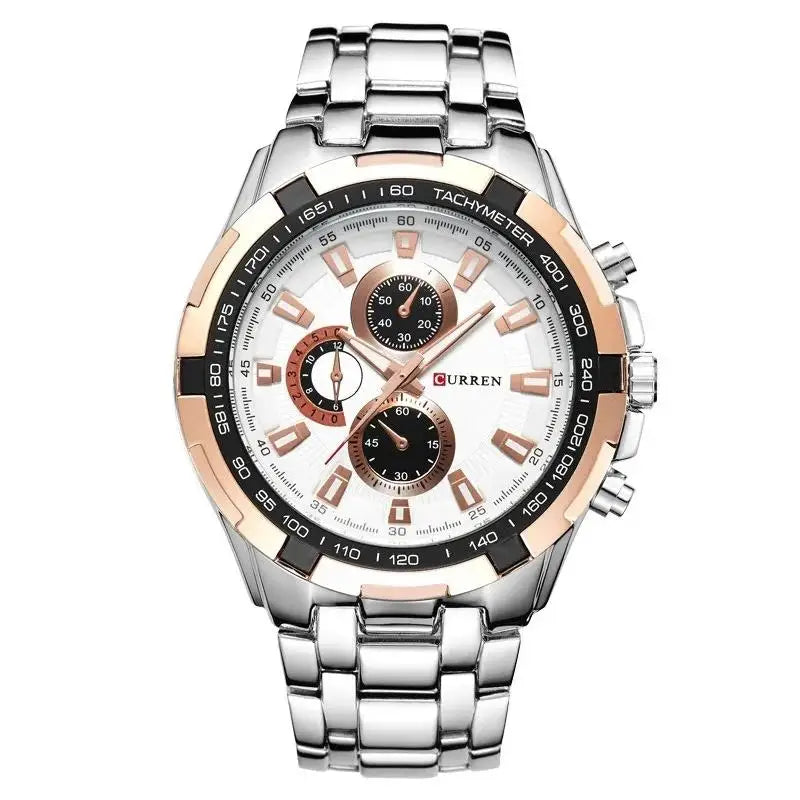 Silver and rose gold watch with white face on a white background