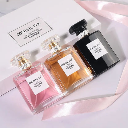 Three COCOS LIYA perfume bottles on a light pink background