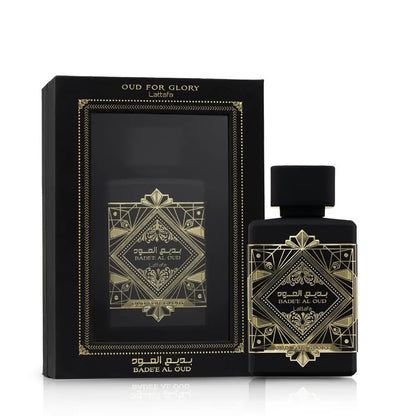 Black and gold perfume bottle and packaging with 'Oud for Glory' branding.