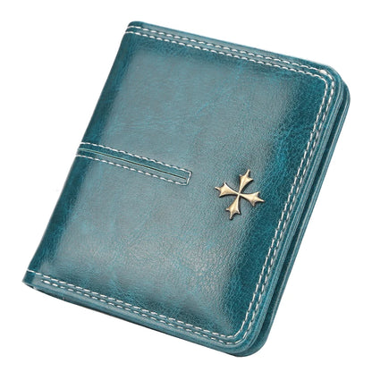 Blue leather wallet with a gold cross emblem on a white background