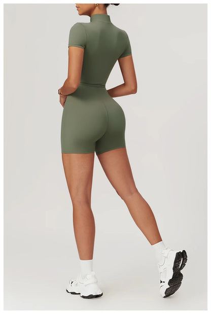 Person wearing a green bodysuit on a white background