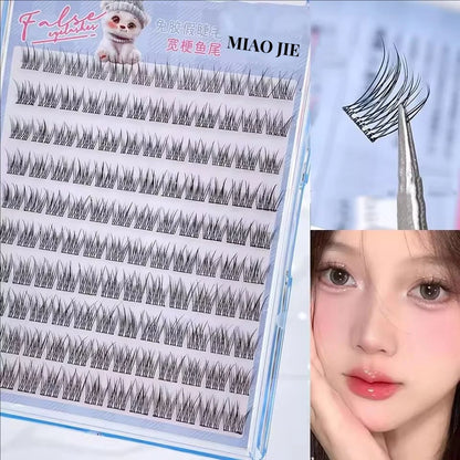 False eyelashes set with a pair applied to a model's eye, featuring the brand 'MIAO JIE'.