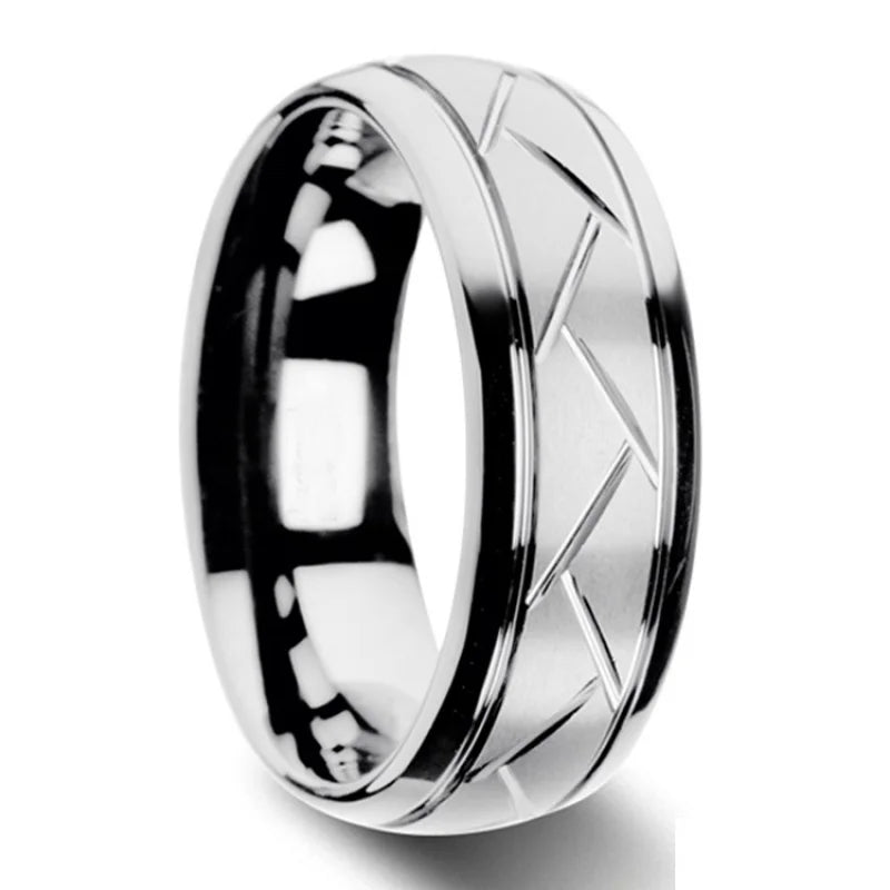 Silver ring with a geometric design on a white background