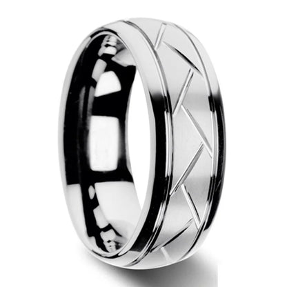 Silver ring with a geometric design on a white background