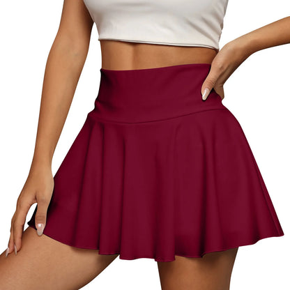 Red skirt worn by a person on a white background