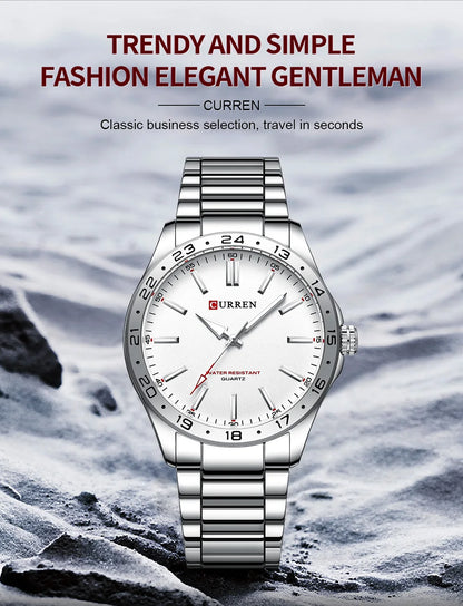 Silver wristwatch with a white dial on a rocky background, featuring the brand 'Curren'.