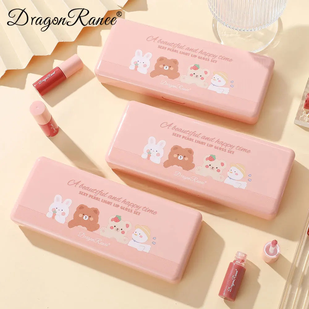Pink cosmetic sets with cartoon designs on a light background, featuring the brand 'Dragon Ranee'.
