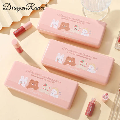 Pink cosmetic sets with cartoon designs on a light background, featuring the brand 'Dragon Ranee'.