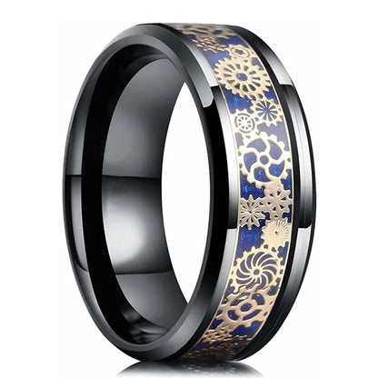 Black ring with gold and blue floral design on a white background