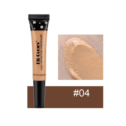 Makeup concealer with applicator and swatch on a white background