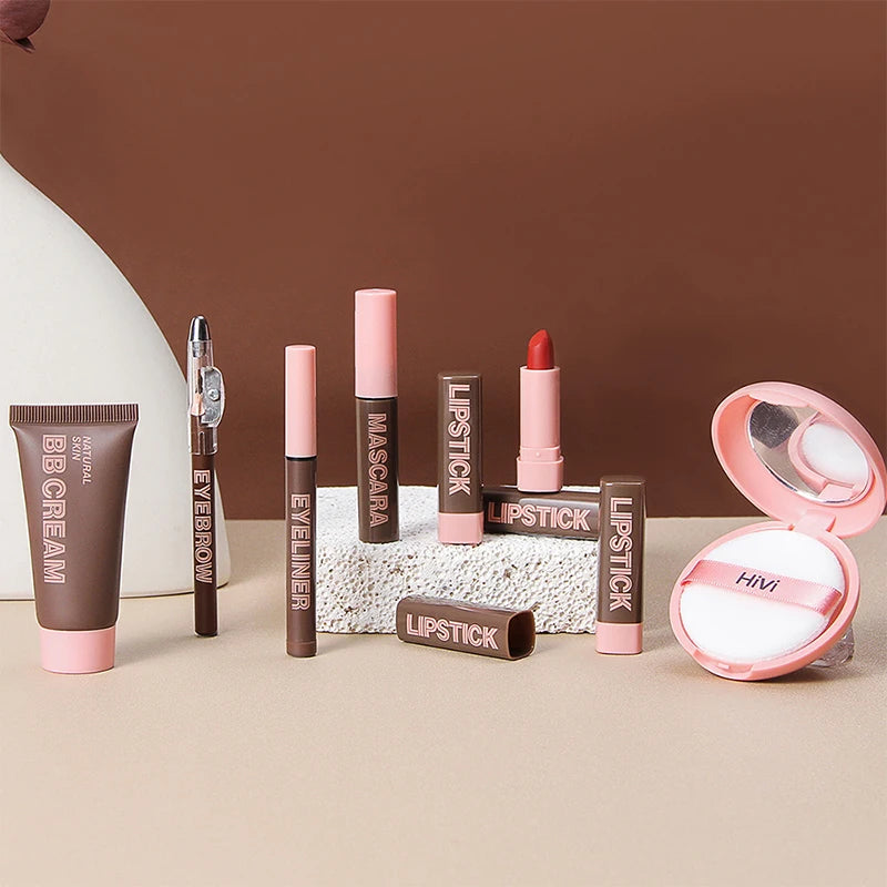 Collection of makeup products including lipsticks, mascara, and BB cream on a neutral background