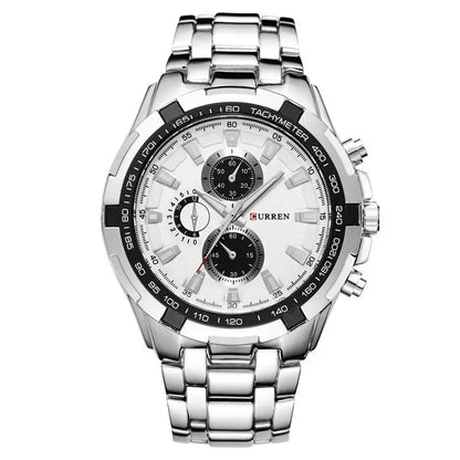 Silver wristwatch with a white face on a white background