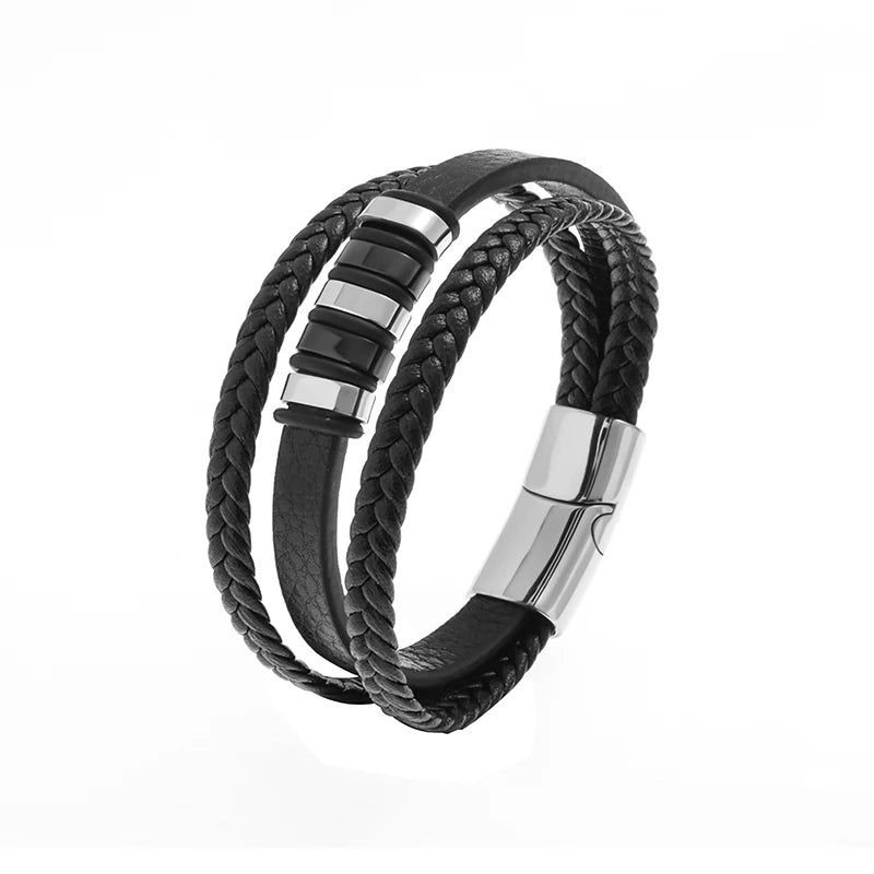 Black braided leather bracelet with silver metal clasp on a white background