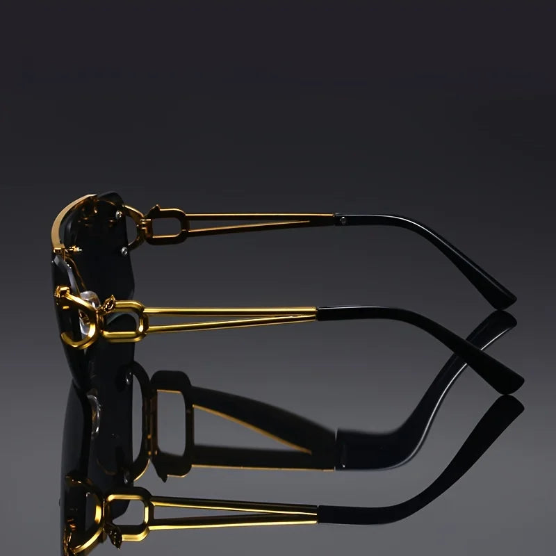 Sunglasses with black and gold frame on a reflective surface with a dark background