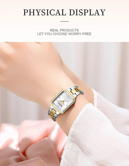 Gold and silver watch on a wrist with a soft background