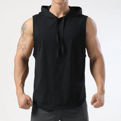 Person wearing a black sleeveless hoodie on a white background