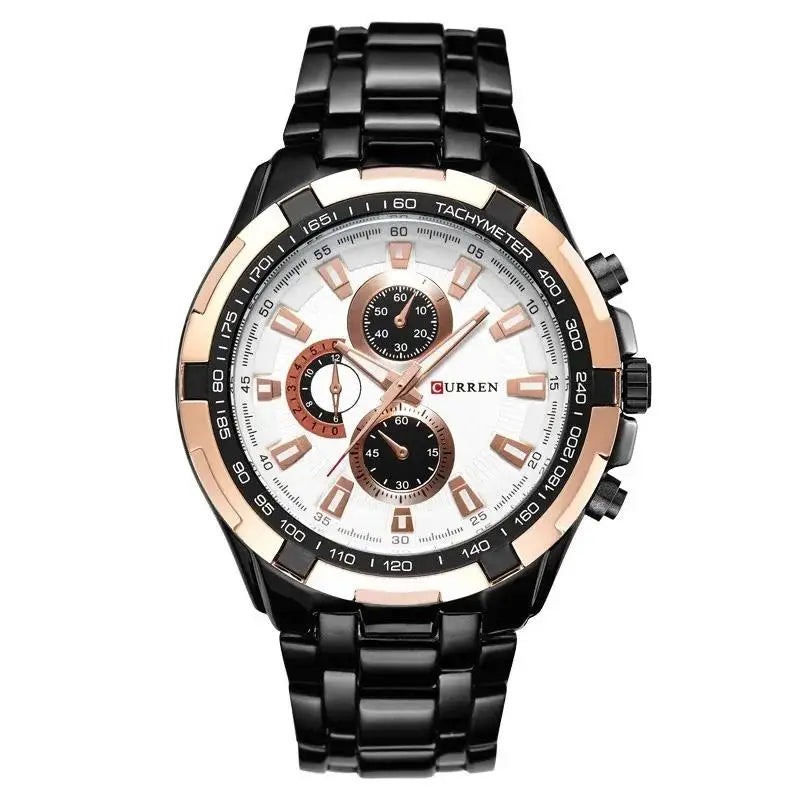 Black and rose gold watch with white face on a white background