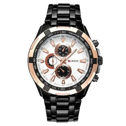 Black and rose gold watch with white face on a white background