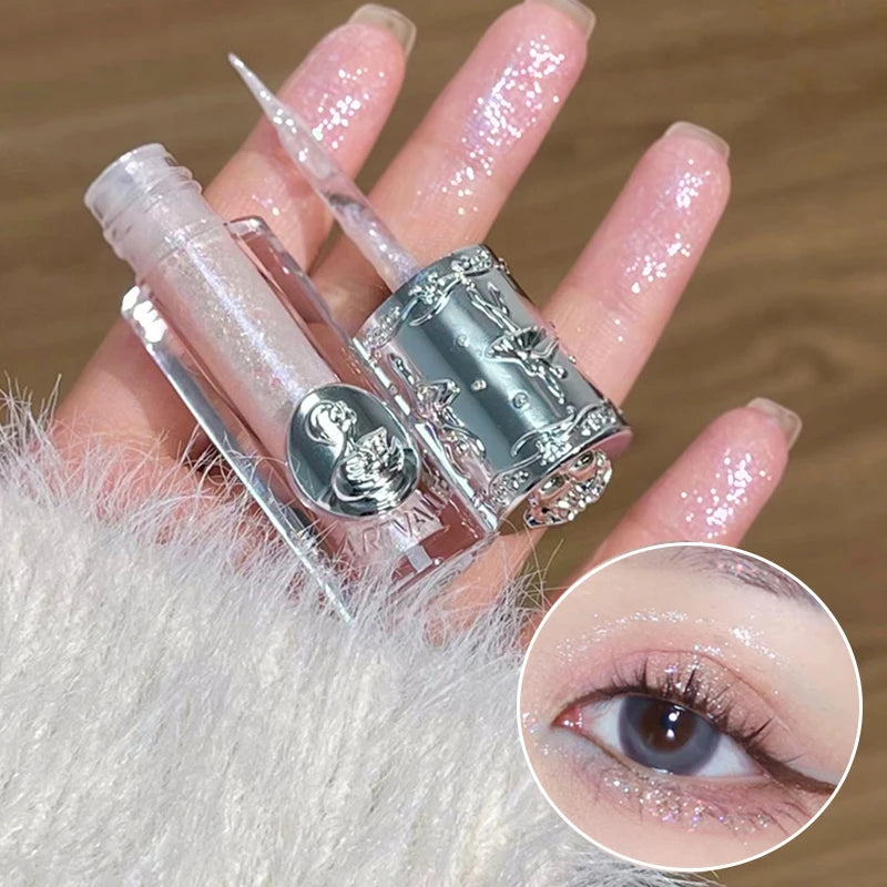 Silver glittery eyeliner with applicator on a hand, close-up of eye application.