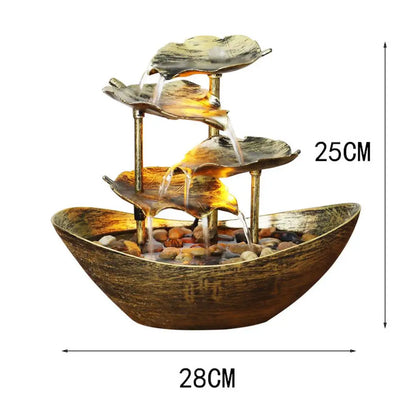 Decorative water fountain with leaf designs and dimensions indicated on a white background