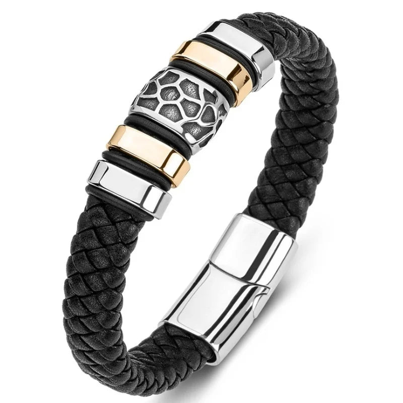 Black braided leather bracelet with silver, gold, and honeycomb patterned metal clasp on a white background