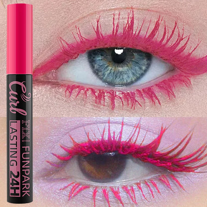 Eyelash curler with pink eyelashes applied on a close-up of an eye.
