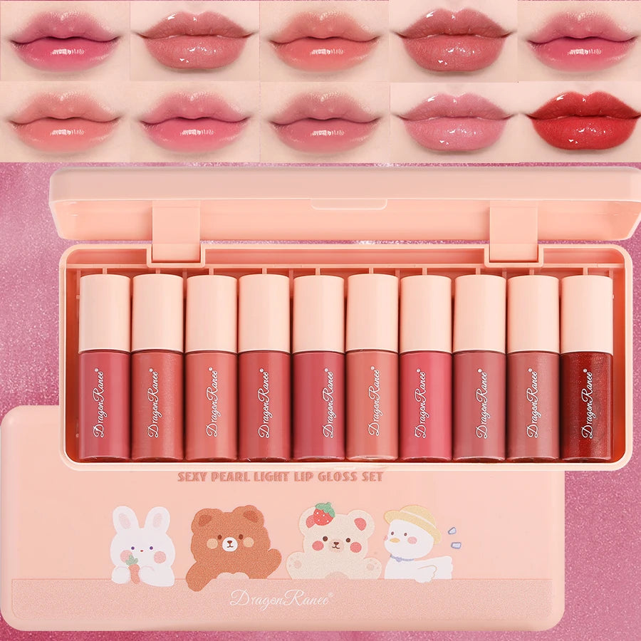 Set of lip glosses in a pink case with cartoon characters on a pink background