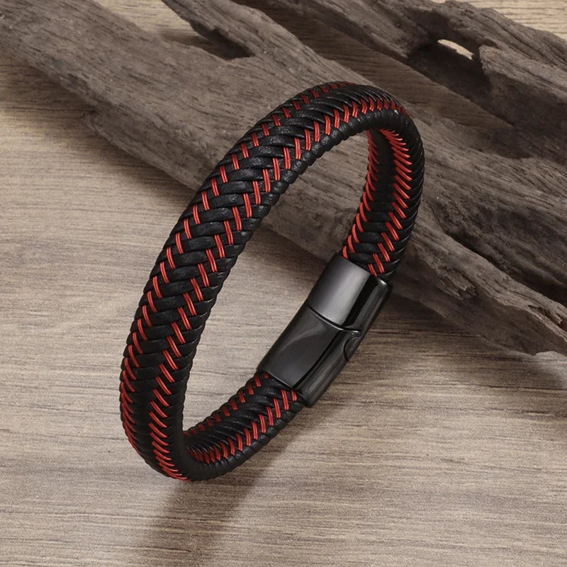 Black and red braided bracelet on a wooden surface