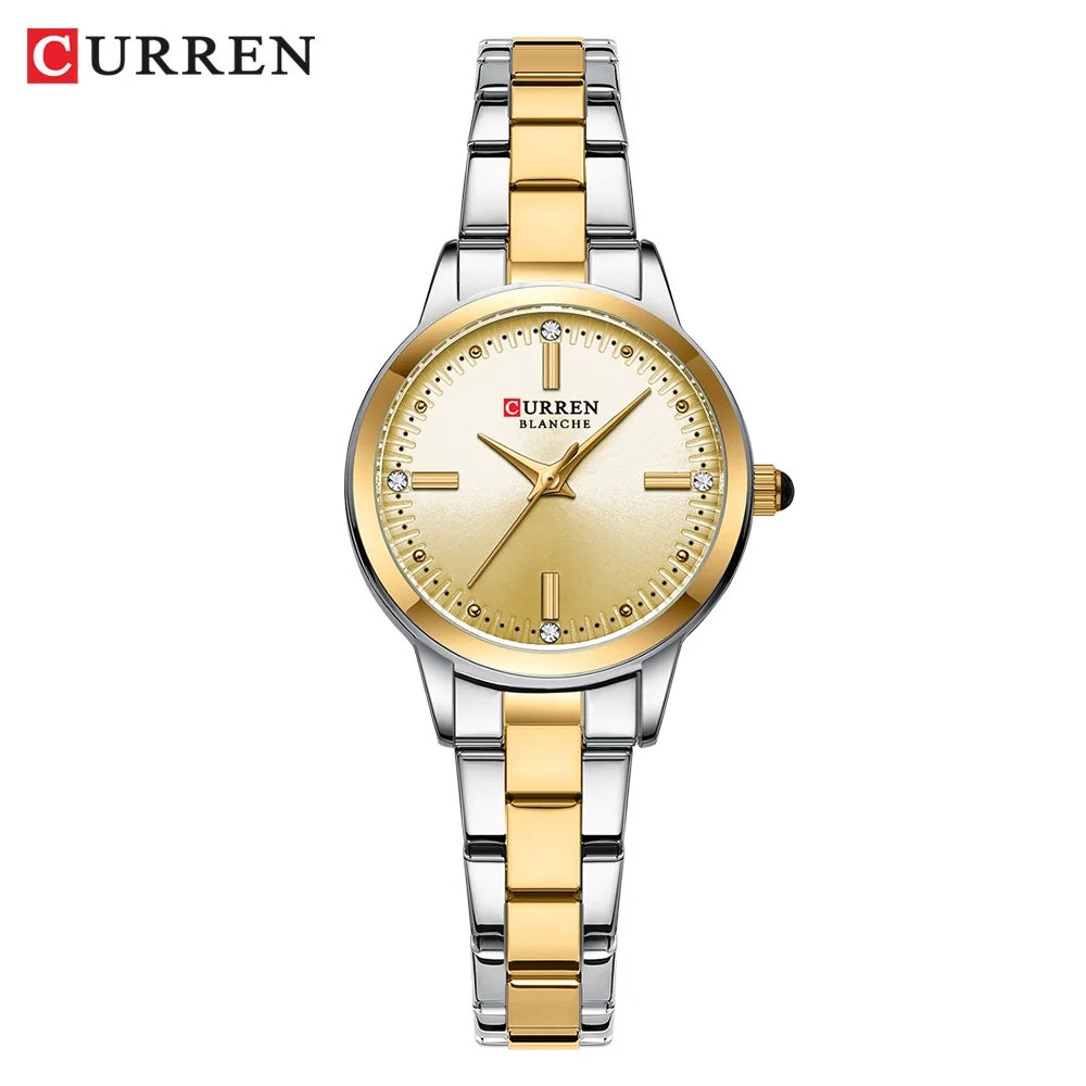 Curren watch with gold and silver band on a white background