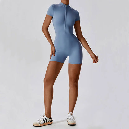 Person wearing a blue bodysuit on a white background